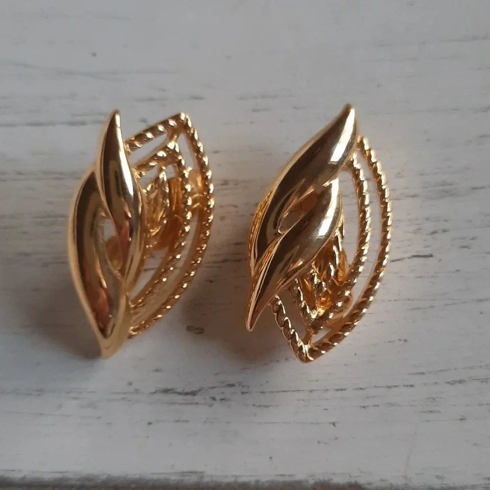Vintage Trifari Gold Tone Clip On Earrings Abstracted Leaf Shapes Open Design